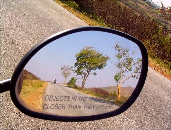 Rear view mirror caption
